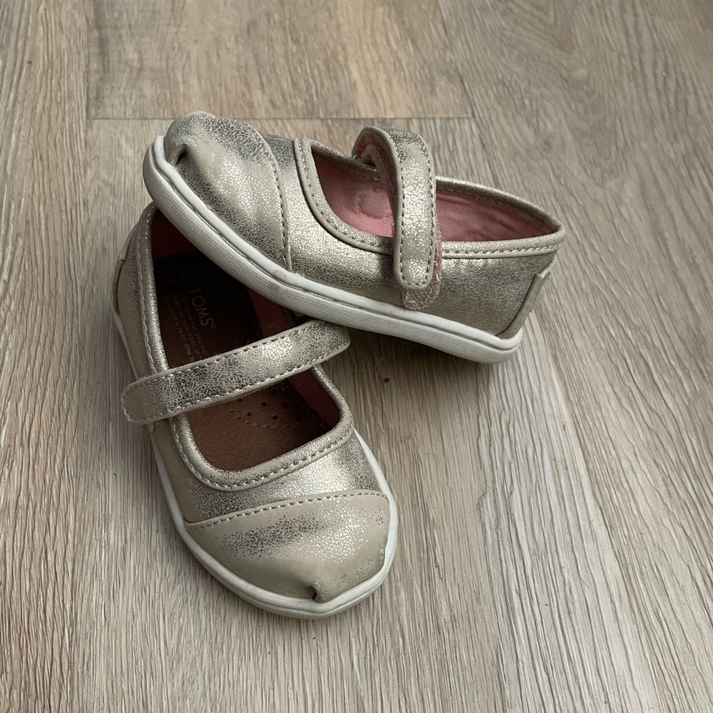 Tom’s gold Mary Janes toddler 5